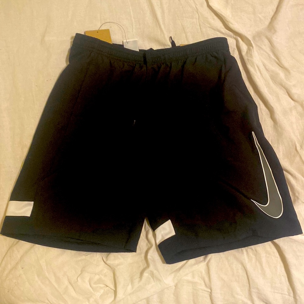 Black / white trim , Nike dri fit running shorts.